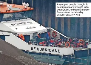  ?? GARETH FULLER/PA WIRE ?? A group of people thought to be migrants are brought in to Dover, Kent, onboard a Border Force vessel on Monday