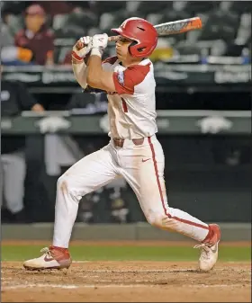  ?? Andy Shupe/NWA Democrat-Gazette ?? Making contact: Arkansas second baseman Robert Moore singles against Grand Canyon during a game at Baum-Walker Stadium in Fayettevil­le on Tuesday, March 10, 2020. Arkansas and Grand Canyon meet Friday at noon in the Stillwater Regional.