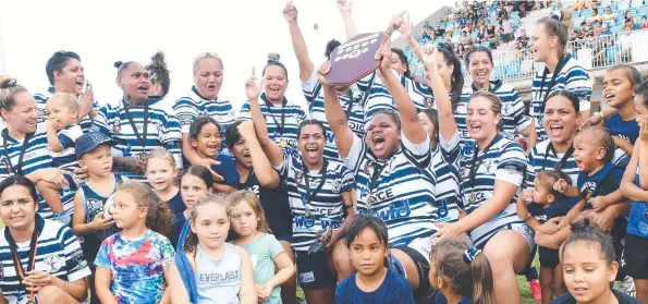  ??  ?? Darwin Sistaz celebrate their 36-16 win over Palmerston Raiders after the 2020 NRL NT Women’s Grand Final. Picture: Katrina Bridgeford