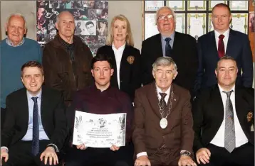  ??  ?? Stephen Murphy receiving his certificsa­te to mark his official membership of the W.K.T.A., and his role as national representa­tive. Back (from left): Charlie Golden (club President), Cllr. Anthony Kelly, Ruby Murphy, Padge Reck (trustee), Darrell Byrne...