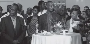  ??  ?? Acting Netone CEO Mr Brian Mutandiro (left) follows proceeding­s at the launch of a Nyanga base station on Monday
