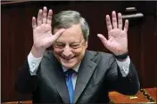  ?? PTI ?? Italian Premier Mario Draghi waves to lawmakers at the end of his address at the Parliament in Rome, Thursday