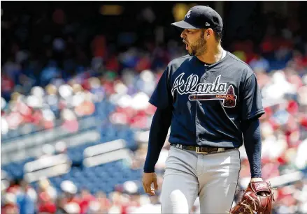  ?? BRANDON / AP ?? Braves starting pitcher Anibal Sanchez walks slowly, painfully off the field after being hit by a ball off the bat of the Nationals’ Michael Taylor at the end of the second inning Thursday in Washington, D.C. Sanchez did not return to the game, which the Braves lost 6-3.ALEX