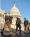  ??  ?? National Guard members at the Capitol in Washington DC