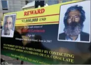  ?? MANUEL BALCE CENETA — THE ASSOCIATED PRESS FILE ?? This FBI poster shows a composite image of of how former FBI agent Robert Levinson would look now after five years in captivity, right, and an image of him taken from a video released by his kidnappers, left. The poster was shown in Washington during a...