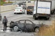  ?? PETE BANNAN ?? A crash in the westbound lanes of the Pennsylvan­ia Turnpike at the Malvern slip ramp, mile marker 319.9, sent one person to the hospital Friday afternoon.