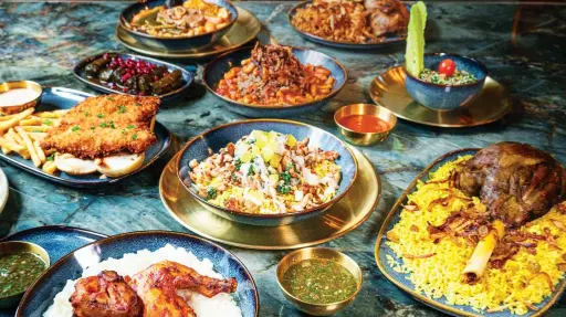  ?? Images supplied ?? (Right) A typical iftar spread at Queen Mama’s Kitchen (below) in Portland, Oregon, run by Saudi chef Maha Alharbi. (Bottom) Alharbi’s jareesh — one of her most popular dishes. For her recipe, visit arabnews.com