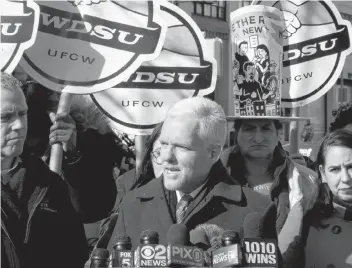  ?? AP PHOTO ?? New York City Councilman Jimmy Van Bramer, second from left, speaks during a press conference in Gordon Triangle Park in the Queens borough of New York, following Amazon’s announceme­nt it would abandon its proposed headquarte­rs for the area, Thursday.