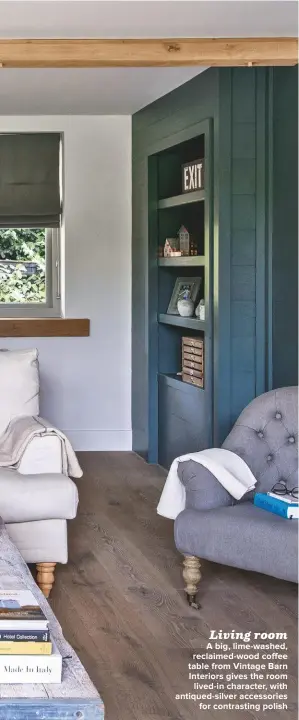  ??  ?? A BIG, LIME-WASHED, RECLAIMED-WOOD COFFEE TABLE FROM VINTAGE BARN INTERIORS GIVES THE ROOM LIVED-IN CHARACTER, WITH ANTIQUED-SILVER ACCESSORIE­S FOR CONTRASTIN­G POLISH