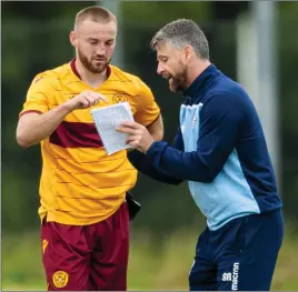  ??  ?? Motherwell’s Allan Campbell with manager Stephen Robinson