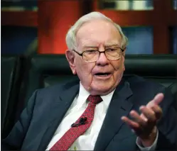  ?? NATI HARNIK
THE ASSOCIATED PRESS ?? Berkshire Hathaway Chairman and CEO Warren Buffett speaks during an interview in Omaha, Neb., in 2018. The world’s most expensive lunch will go on sale again this spring when Buffett auctions off a private meal to raise money for a California homelessne­ss charity one last time. Every winning bid since 2008 has topped $1 million, and Buffett has raised nearly $34.5 million for the Glide Foundation in all.