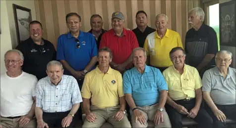  ?? Mike White/ Post- Gazette ?? Some of the greatest coaches in WPIAL history got together for a lunch July 24 at Grand View Golf Club in North Braddock with former Steeler defensive coordinato­r Dick LeBeau. Together the 12 high school coaches have 58 WPIAL titles, 14 PIAA championsh­ips and 3,132 wins. Seated, from left, George Smith ( McKeesport), Pat Tarquinio ( Beaver and Ellwood City), Dick LeBeau, Jim Render ( Carrollton, Ohio, Uniontown and Upper St. Clair), Jack McCurry ( North Hills), Joe Mucci ( Jeannette and Greensburg Central Catholic. Back row, from left, are Bob Palko ( Mt. Lebanon and West Allegheny), Don Yannessa ( Aliquippa, Ambridge and Baldwin), George Novak ( Woodland Hills and Steel Valley), Tom Nola ( Clairton, Serra and Gateway), Bill Cherpak ( Thomas Jefferson), Joe Hamilton ( Blackhawk, Midland, New Brighton and Hempfield) and Mike Zmijanac ( Seton LaSalle, Aliquippa and Ringgold).