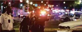  ?? (Foto AGENSI) ?? Sebahagian polis mengawal lokasi kejadian tembakan di kawasan 14 dan U Street di Washington DC.