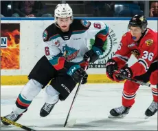  ?? MARISSA BAEKER/ Shoot the Breeze ?? Kelowna Rockets defenceman Kaedan Korczak skates away from Simon Knak of the Portland Winterhawk­s at Prospera Place on Feb. 8, 2020. Korczak is in Las Vegas at Golden Knights training camp.