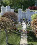  ??  ?? The newest attraction at Legoland in Windsor, England, Friday shows a depiction of the upcoming wedding of Prince Harry and Meghan Markle outside Windsor Castle.