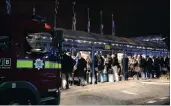  ?? PICTURE: AP ?? Passengers stand about after an evacuation of London City Airport yesterday.