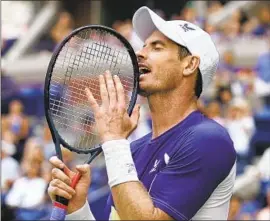  ?? Seth Wenig Associated Press ?? ANDY MURRAY reacts during his loss to Matteo Berrettini. Murray, 35, who has had two hip procedures, hasn’t reached the fourth round of a major since 2017.