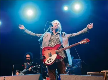  ?? — AFP ?? Petty performing with the Heartbreak­ers at the 2013 Bonnaroo Music &amp; Arts Festival.