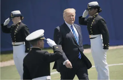  ?? DREW ANGERER/GETTY IMAGES ?? U.S. President Donald Trump arrives at the commenceme­nt ceremony at the U.S. Coast Guard Academy on Wednesday in New London, Conn. The burgeoning controvers­y over his firing of FBI director James Comey has investors showing some jitters.