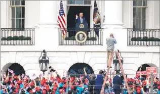  ?? MANUEL BALCE CENETA AP ?? President Donald Trump speaks from the Blue Room Balcony of the White House to a crowd of supporters Saturday in Washington.