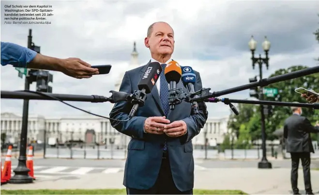  ?? Foto: Bernd von Jutrczenka/dpa ?? Olaf Scholz vor dem Kapitol in Washington: Der Spd-spitzenkan­didat bekleidet seit 20 Jahren hohe politische Ämter.