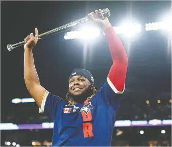  ?? DUSTIN BRADFORD/GETTY IMAGES ?? Blue Jays first baseman Vladimir Guerrero Jr. salutes the crowd after being named MVP at the MLB All-Star Game on Tuesday at Coors Field in Denver, Colo.
