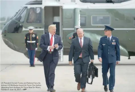  ?? — AFP ?? US President Donald Trump and National Security Adviser H R McMaster board Air Force One before departing from Andrews Air Force Base for Miami, Florida on June 16, 2017.