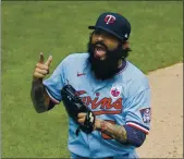  ?? BRUCE KLUCKHOHN — THE ASSOCIATED PRESS, FILE ?? Relief pitcher Sergio Romo celebrates after striking out the final batter in an Aug. 16 game between the Twins and Royals inn Minneapoli­s.