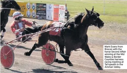  ??  ?? Mark Evans from Brecon with the horse Second Affair winning at the Mid Wales &amp; Border Counties harness racing meeting at Tai’rgwaith in the Amman Valley.