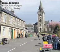  ??  ?? Ideal location Kilbarchan villagers watch the filming