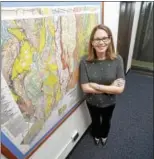  ?? ARNOLD GOLD / HEARST CONNECTICU­T MEDIA ?? Geology and geophysics professor Maureen Long is photograph­ed with a geological map of Connecticu­t at Yale University’s Kline Geology Laboratory in New Haven.