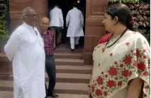  ?? — ASIAN AGE ?? TMC MP Saugata Roy talks to Union textiles minister Smriti Irani at Parliament House during the ongoing Monsoon Session in New Delhi on Thursday.