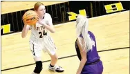  ?? MARK HUMPHREY ENTERPRISE-LEADER ?? Prairie Grove sophomore Camryn Cash operates in the corner against Berryville. Cash hit key shots down the stretch and scored eight points to help the Lady Tigers win a third straight 4A-1 girls basketball game on Jan. 26.
16 for Berryville.