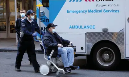  ?? Photograph: Peter Foley/EPA ?? A person arrives at Mount Sinai West hospital in New York, New York, on Thursday.