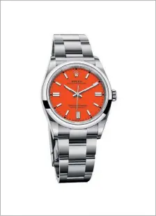  ??  ?? Oyster Perpetual 36 with coral red dial