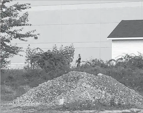  ?? SUBMITTED ?? High school student Haylee Rafuse snapped this photo of an armed RCMP officer outside Avon View High School Sept. 20.