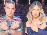  ??  ?? XCITING TURNS Robbie and Ayda on show