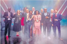  ??  ?? The VWSA team celebrates being named Brand of the Year 2020 with #CarsAwards and WesBank management.