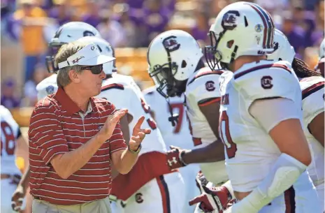  ?? DERICK E. HINGLE, USA TODAY SPORTS ?? Steve Spurrier, left, will go down as one of the game’s greatest coaches, ex- Georgia coach and athletics director Vince Dooley says.