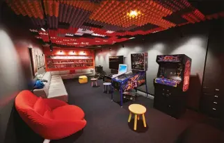  ??  ?? The ‘Sulking Room’, designed as a space for any visiting teenagers to hang out in. It’s right next to Pyroland, a Team Fortress 2- themed playground for staff’s younger children, which is furnished with – among other things – a giant Balloonico­rn