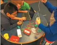  ?? SUBMITTED PHOTO ?? Students use play dough to learn basics of electrical circuits.