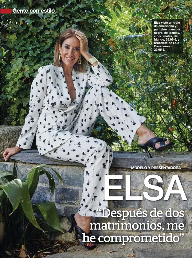  ??  ?? Elsa viste un traje de americana y pantalón blanco y negro, de Iceplay, c.p.v.; mules, de Mango, 39,99 €, y brazalete de Lola Casademunt, 29,95 €.