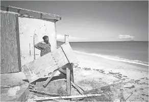  ??  ?? “I don’t sleep at night,” says Irma Torres, 75, who saw Hurricane Maria push the sea right up to her kitchen window. “I think too much.” CARRIE COCHRAN/USA TODAY