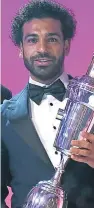  ??  ?? Reds striker Mo Salah with his PFA player of the year award.