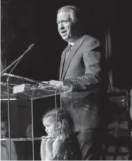  ??  ?? Michael Pollak, recipient of the Wellington Webb Award, with his granddaugh­ter, Belle.