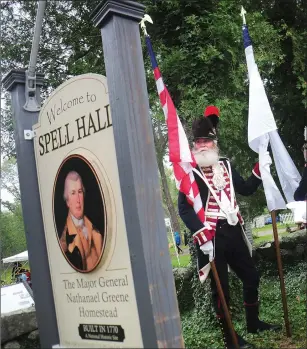  ?? Ernest A. Brown/The Call ?? Captain Robert Allen Greene II, of East Greenwich, a member of the Kentish Guards and a descendant of Major General Nathanael Greene, pauses by the entrance to the Major General Nathanael Greene Homestead before taking part in ceremonies marking the...