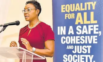  ?? CONTRIBUTE­D ?? Juliet Cuthbert Flynn, state minister in the Minister of Health and Wellness, addressing yesterday’s 8th annual Larry Chang Symposium, which was hosted by the Equality For All Foundation under the theme ‘Pink Sugar: Situating LGBT Jamaicans in the NCD Response’, at The Jamaica Pegasus hotel in New Kingston.