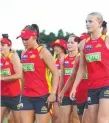  ??  ?? The Suns’ AFLW team attend pre-season training.