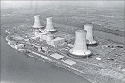  ?? Associated Press ?? This aerial view of the Three Mile Island nuclear power plant near Harrisburg, Pa., was taken in March 1979. Exelon Corp., the owner of Three Mile Island, site of the United States' worst commercial nuclear power accident, said Tuesday it will shut...