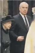  ?? ?? 0 The Queen holds on to Prince Andrew’s arm for support